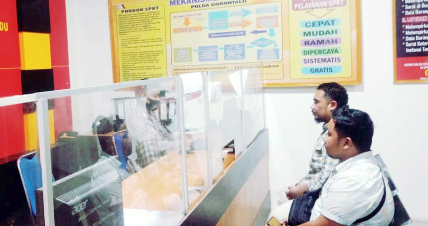 Korban penganiayaan saat melapor ke SPKT Polda Gorontalo.