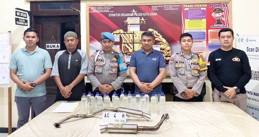 Puluhan botol minuman keras (Miras) jenis cap tikus serta knalpot brong, berhasil disita oleh personel Polsek Kota Utara, saat melaksanakan patroli KRYD.