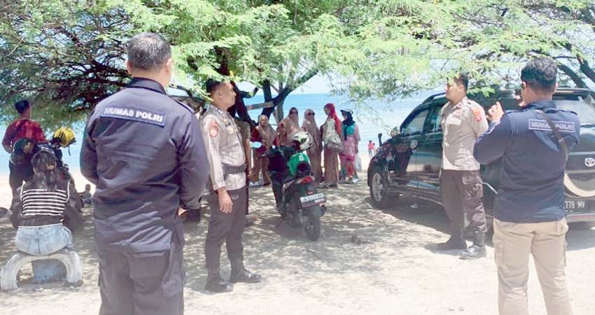 Aparat Kepolisian melakukan pengamanan disejumlah tempat wisata di Gorontalo, guna memastikan masyarakat aman dan nyaman saat liburan.