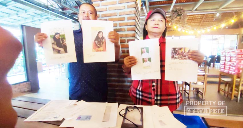 Korban Junidar Nababan saat memperlihatkan sejumlah bukti yang mengakibatkan kerugian terhadap pihaknya yang mencapai belasan miliar. (F. Natha/ Gorontalo Post)