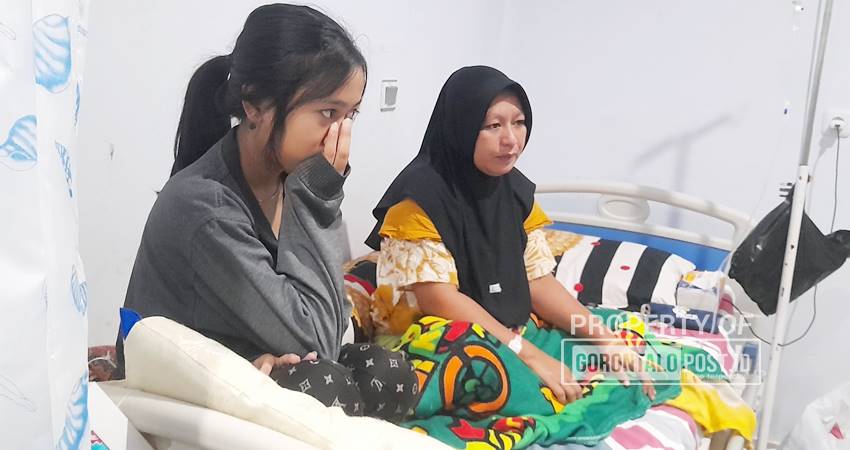 Salah satu pasien mengalami keracunan makan usai menghadiri tahlilal 40 hari di Jalan Lotu, Kelurahan Talumolo, Kecamatan Dumbo Raya, Kota Gorontalo.Ahad (25/5).Foto: Natharahman/Gorontalo Post.