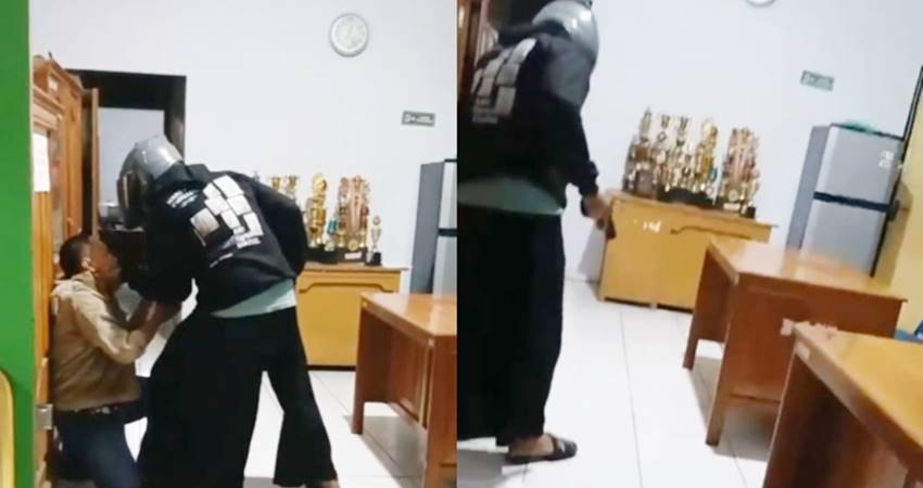 Penggalan gambar yang terekam kamera ketika diduga seorang dosen inisial R mencoba menodongkan pistol kepada seorang ASN di Dinas Sosial, Kabupaten Gorontalo, Rabu (4/6) pagi. (foto : Tangkapan layar)