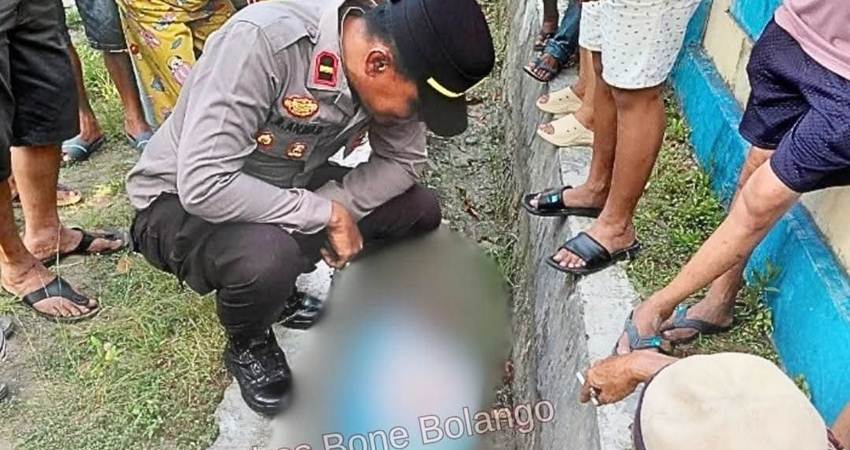 Penemuan mayat di dalam selokan membuat masyarakat Desa Tingkohubu Timur, Kecamatan Suwawa, Kabupaten Bone Bolango heboh dan kaget. (F. Humas Polres Bone Bolango)