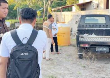 Penarikan. Mobil bak terbuka jenis L-300 oleh Kejari Bone Bolango, Kamis (27/11/2025).