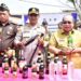 Wali Kota Gorontalo, Adhan Dambea bersama unsur Forkopimda pada pemusnahan belasan ribu botol Miras, Senin (29/12/2025). (Foto: Prokopim)