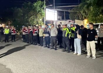Personel Polres Gorontalo melakukan patroli skala besar untuk meningkatkan keamanan di wilayah Kabupaten Gorontalo.