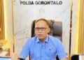 Direktur Reserse Kriminal Umum (Dirreskrimum) Polda Gorontalo, Kombes Pol. Dr. Ade Permana, S.I.K.,M.H., saat diwawancara awak media di ruang kerjanya, Selasa (6/1/2026). (F. Diyanti/Gorontalo Post)