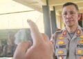 : KLARIFIKASI - AKP Atmal fauzi saat memberikan keterangan persen untuk melaporkan salah satu akun media sosial di Polda Gorontalo.Kamis ( 8/1). Foto : Natharahman/ Gorontalo Post.
