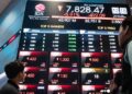 HARGA SAHAM yang memerah ditampilkan di Indonesia Stock Exchange (Bursa Efek Indonesia) Kamis,29 Januari 2026.-Yasuyoshi Chiba-AFP-