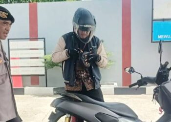 SPBU di Gorontalo Utara yang mendapat pengawasan petugas kepolisian guna mencegah adannya mafia BBM.