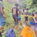 Personel Polres Gorontalo dan Polsek Limboto serta tim inafis melakukan evakuasi terhadap korban yang ditemukan meninggal dunia di lokasi kebun jagung.