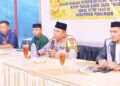 Kapolres Pohuwato, AKBP H. Busroni,S.I.K.,M.H., memimpin rapat bersama Forum Komunikasi Umat Beragama (FKUB), terkait dengan perayaan Nyepi dan idulfitri.