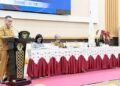Kepala Bapperida Kota Gorontalo, Heru Z. Thalib ketika membacakan laporan panitia kegiatan sosialisasi inovasi daerah serta fasilitasi Hak Kekayaan Intelektual (HKI) di Gedung Banthayo Lo Yiladia (BLY), Senin (11/5/2026).