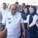 Wali Kota Gorontalo, Adhan Dambea disambut para guru saat membuka SPMB tahun 2026 tingkat Kota Gorontalo, Rabu (3/6). (foto: istimewa)