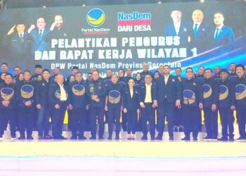 Gubernur Gorontalo Gusnar Ismail bersama saat menghadiri pelantikan pengurus Dewan Pimpinan Wilayah (DPW) Partai NasDem Provinsi Gorontalo yang dipimpin Rachmat Gobel di Grand Palace Convention Center, Rabu (17/6/2026).